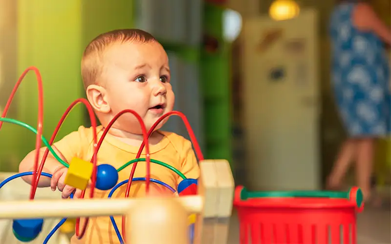 Happy baby playing